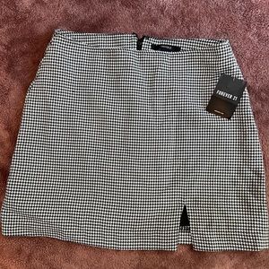 Checkered short skirt. Forever21, tags on. Size M